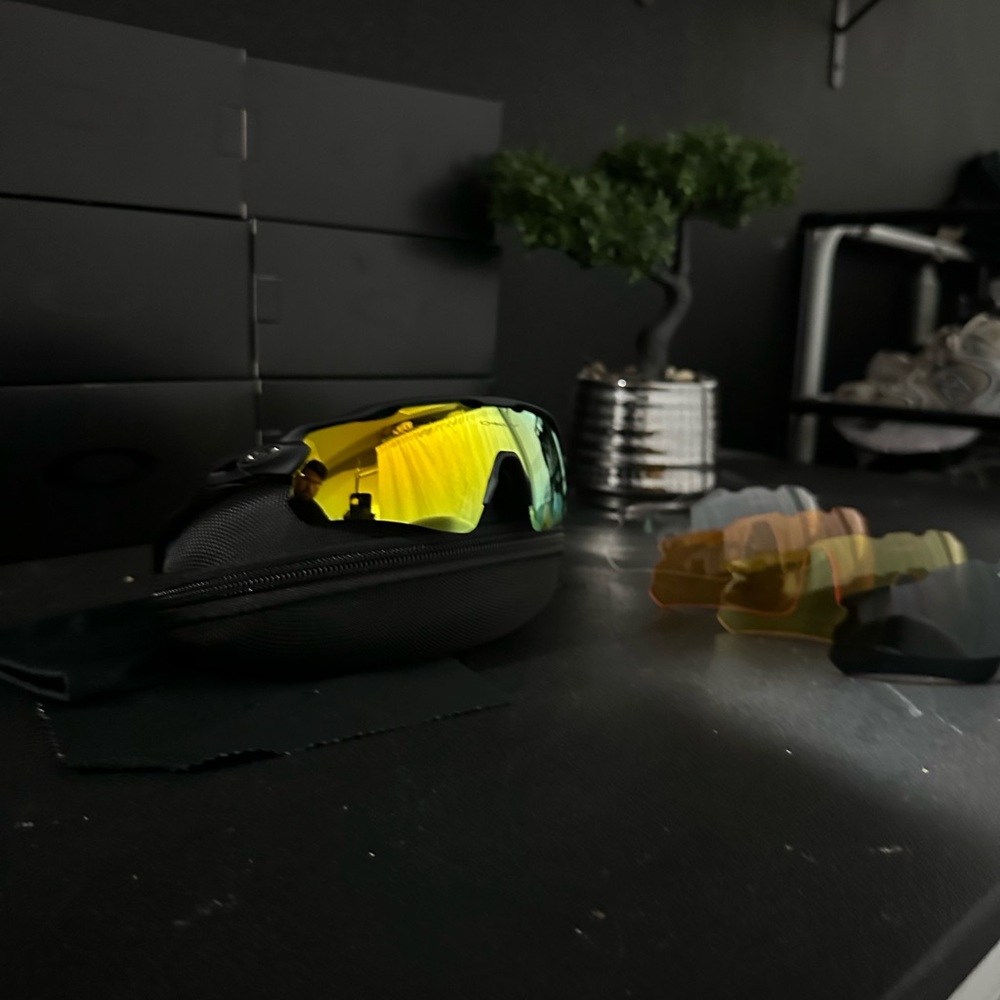 Black Oakley Sunglasses with Silver lenses